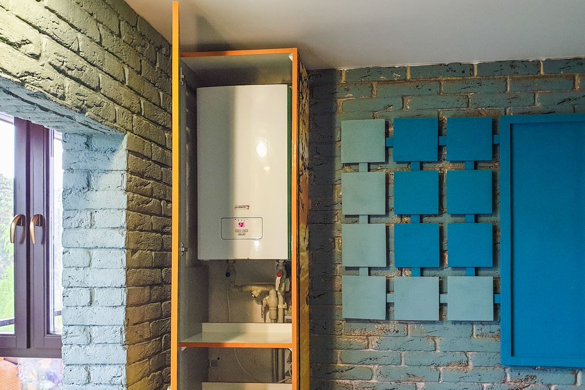 Water heater and tank systems in a home mechanical room